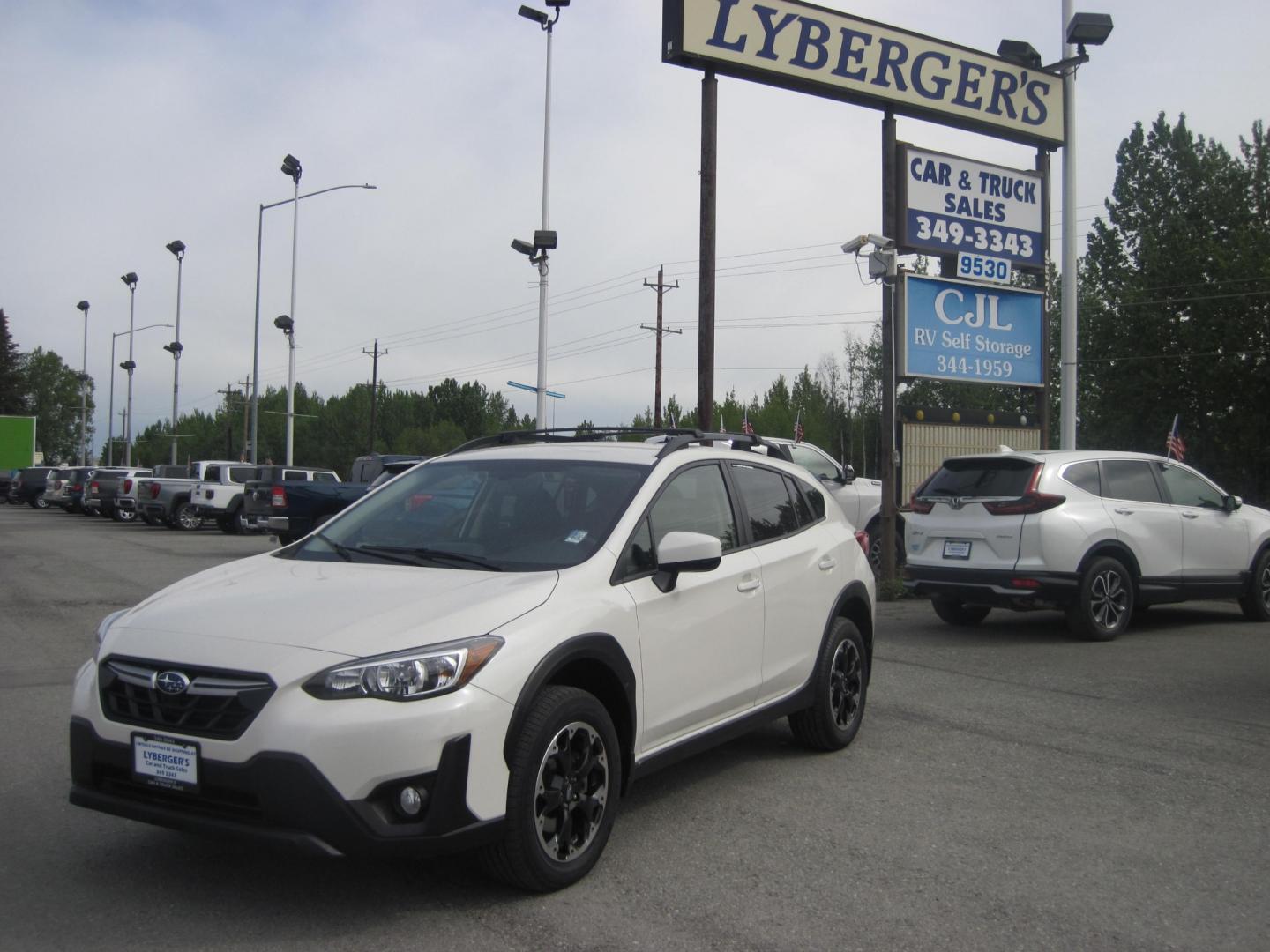 2021 white /black Subaru Crosstrek 2.0i Premium CVT (JF2GTAPC0M8) with an 2.0L L4 DOHC 16V engine, CVT transmission, located at 9530 Old Seward Highway, Anchorage, AK, 99515, (907) 349-3343, 61.134140, -149.865570 - Nice Subaru Crosstrek come take a test drive - Photo#0